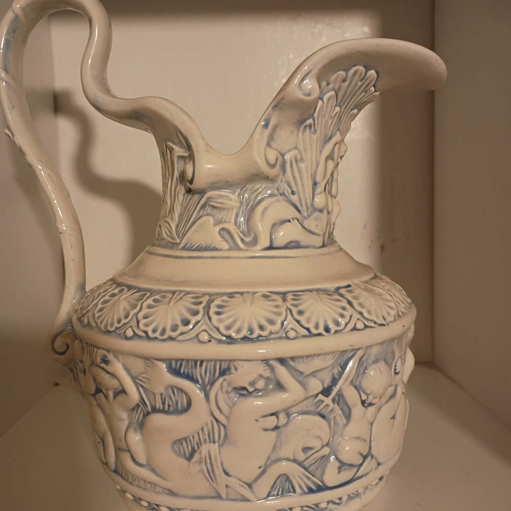 Elegant Cream and Blue Ceramic Pitcher
